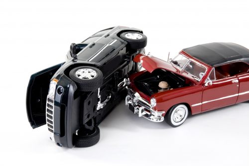close up of collectible car over white background